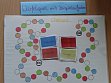 Würfelspiel mit Beispielaufgaben